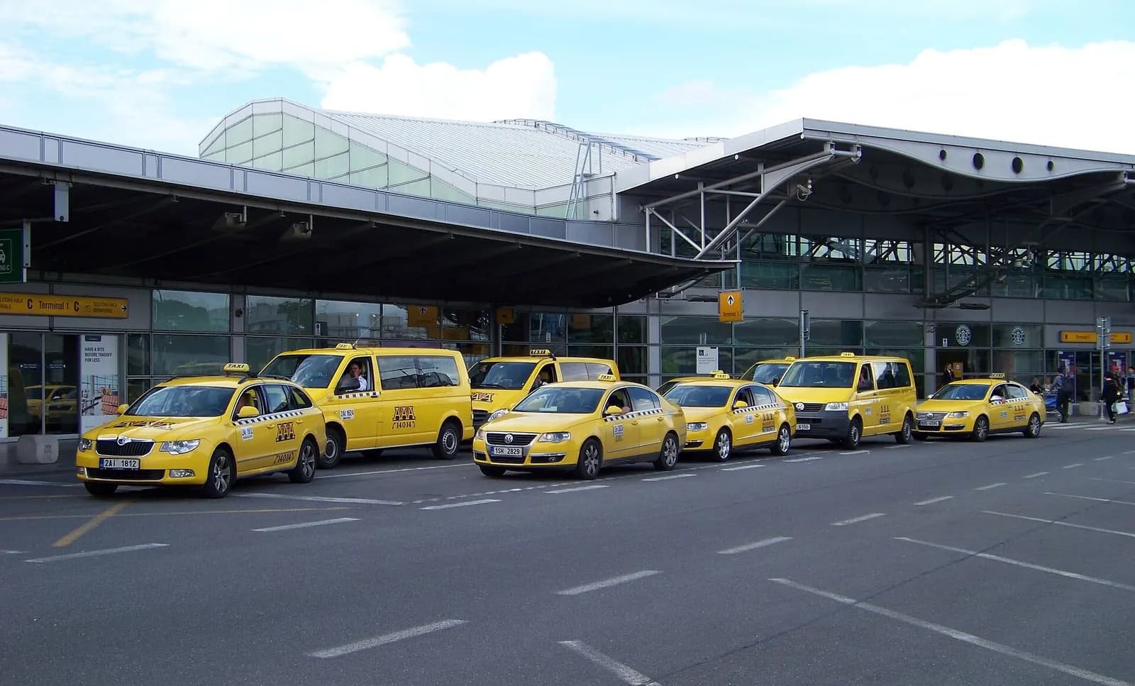 Prague - Ruzyně , the Czech Republic . The Airport, terminal 1, a taxicab stand.