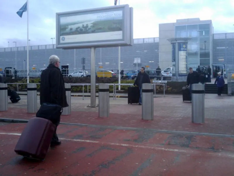 Landside entrance outside Aberdeen Airport’s main terminal looking toward the car park.