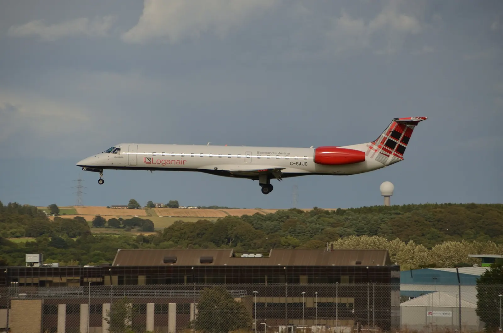 Loganair turboprop on short final for landing at Aberdeen Airport.