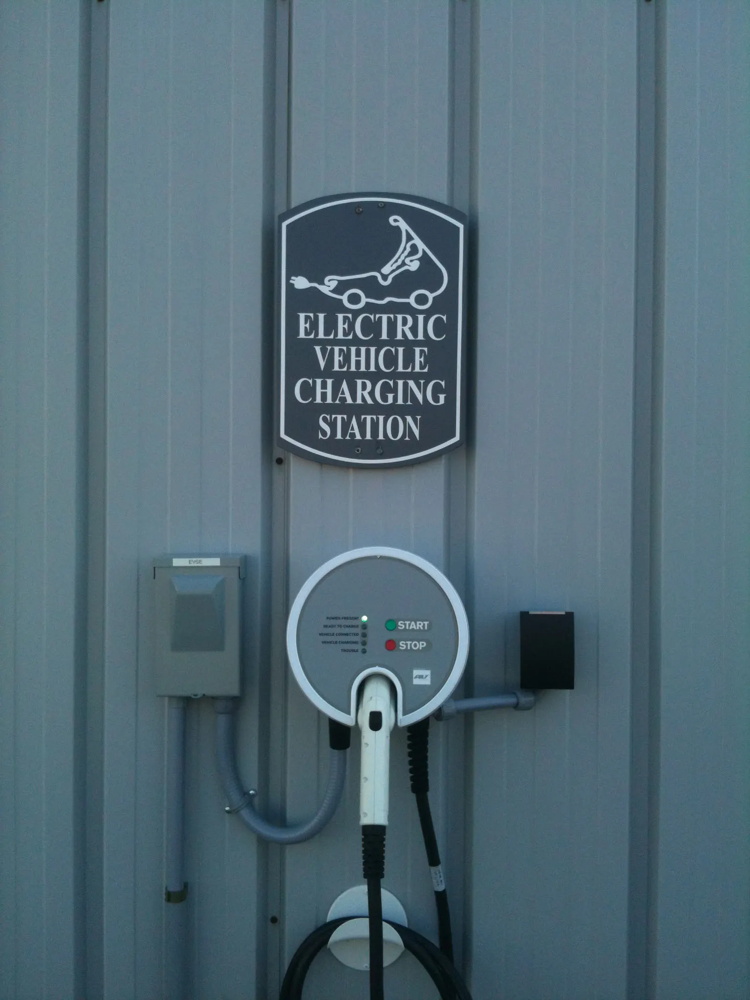 Closeup of the Cape Air Nissan Leaf electric vehicle charging station at Nantucket Airport in Nantucket, Massachusetts.