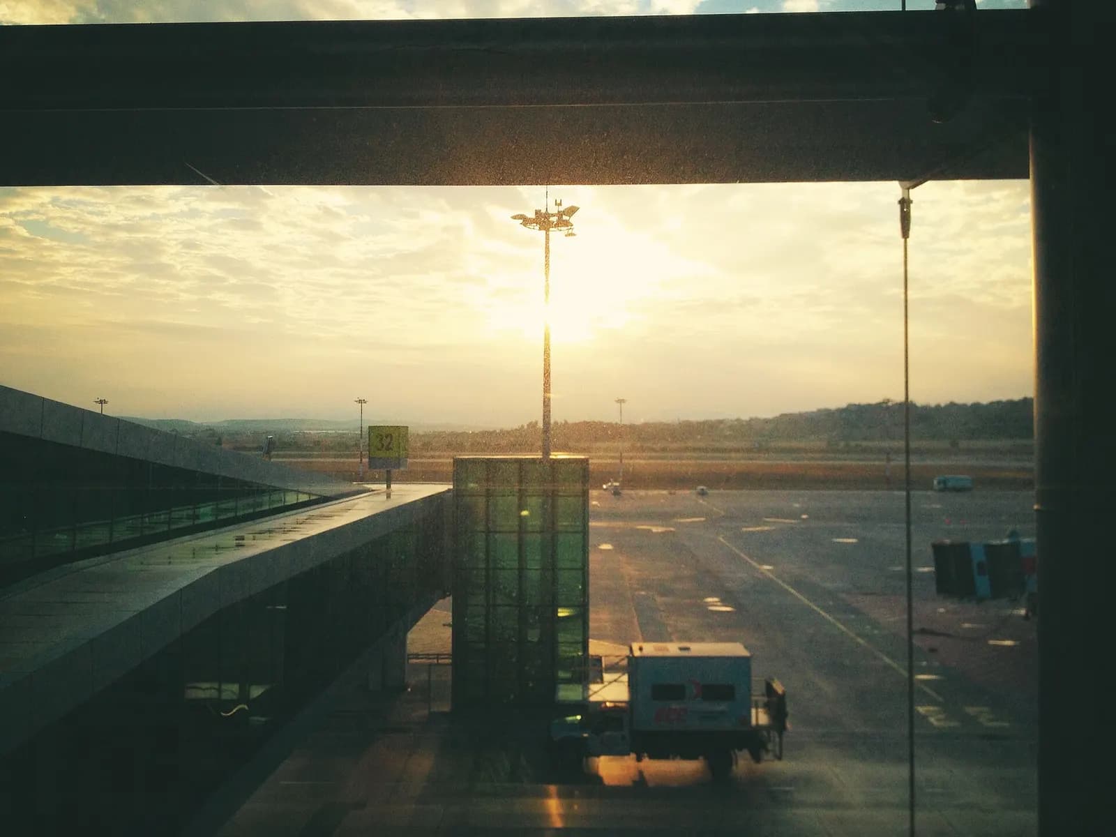 Sun rising at gate 32 of the İzmir Adnan Menderes Airport.