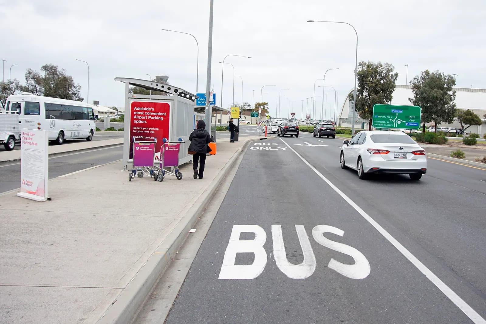 Adelaide has one of Australia's few airports with a regular bus service (J1 and J2). The bus stop is a short walk from the terminal, away from the congested taxi rank, hire car concession and private vehicle drop-off area.