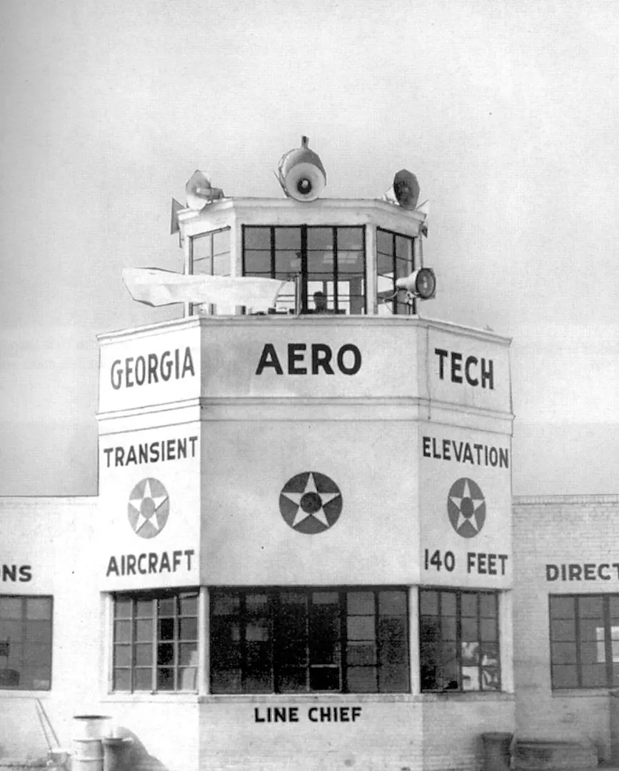 1943 operations building and control tower at Bush Field. Historic WWII contract-school architecture, not the current FAA tower or 2007 hall.