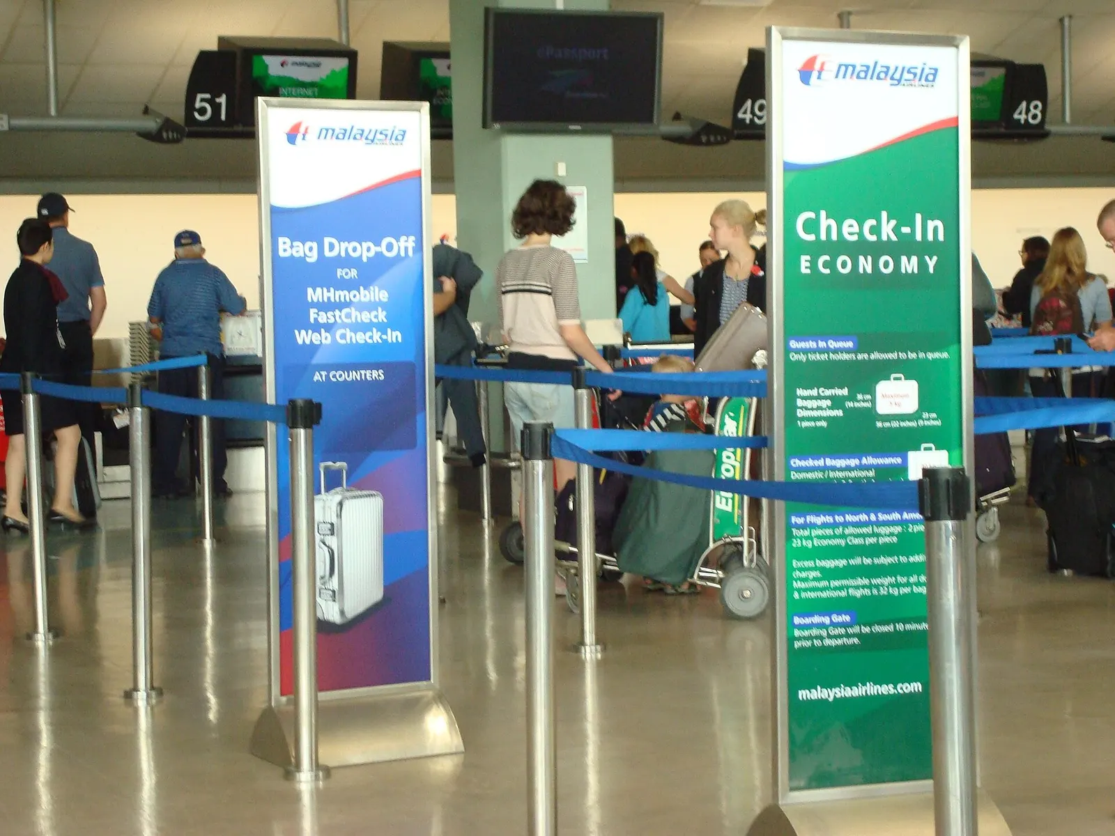 Malaysia Airlines Check-in — at International Terminal Auckland Airport.