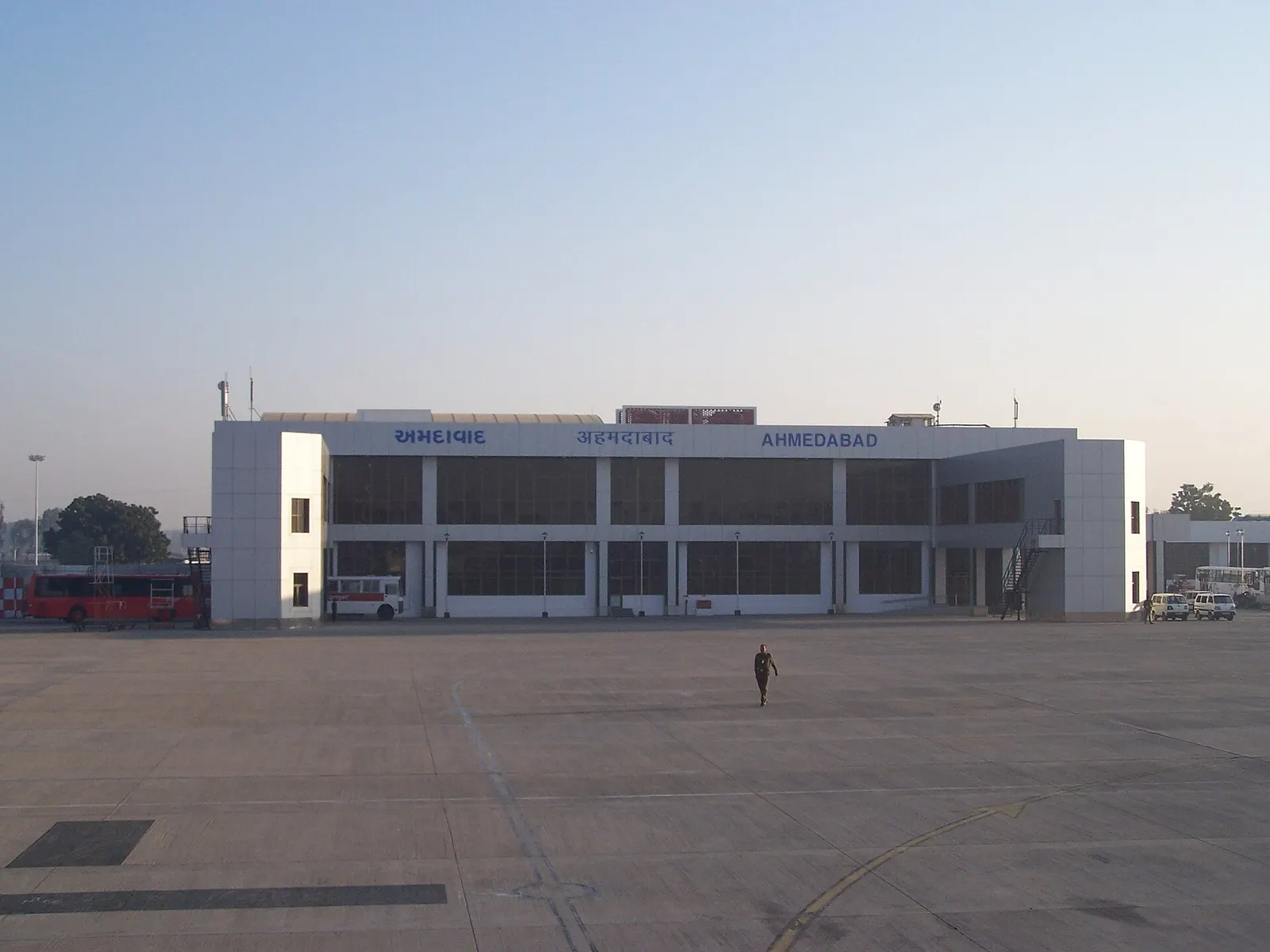 Airside facade of Sardar Vallabhbhai Patel International Airport with AHMEDABAD lettering in Gujarati, Hindi, and English