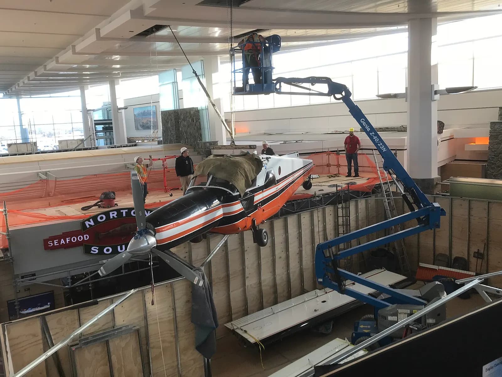 N754's fuselage is installed above Norton Sound Seafood restaurant at the Ted Stevens Anchorage International Airport. N754 was modified specifically for conducting wildlife surveys. It was flow nearly 15,000 hours before being retired in 2011. Photo: Rob Stapleton, Alaska Aviation Museum