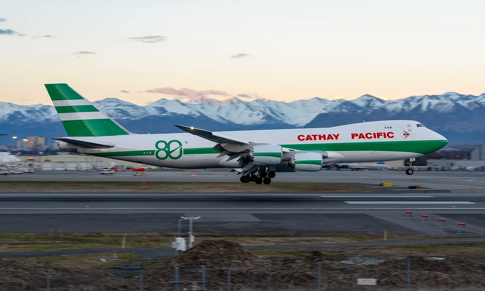 Cathay Pacific Cargo Boeing 747-8F (B-LJE) landing at Ted Stevens Anchorage International Airport in Anchorage, Alaska, USA. It's painted in Cathay Pacific’s 80th-anniversary retro “lettuce leaf sandwich” livery.