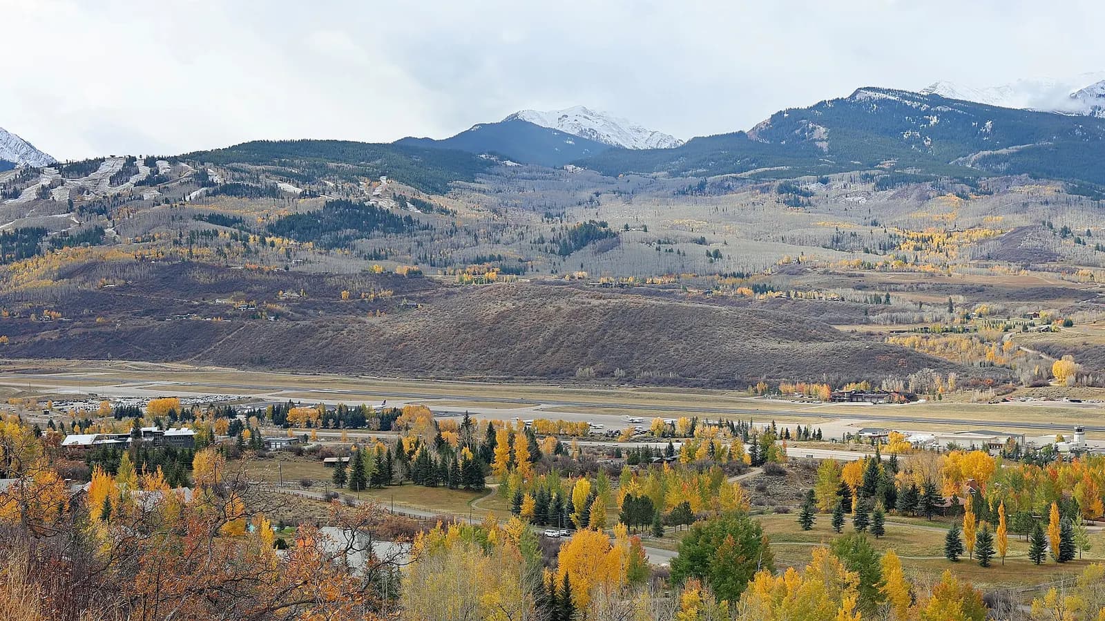 Aspen/Pitkin County Airport campus from the northeast with Buttermilk Ski Area on the left, 13 October 2025.