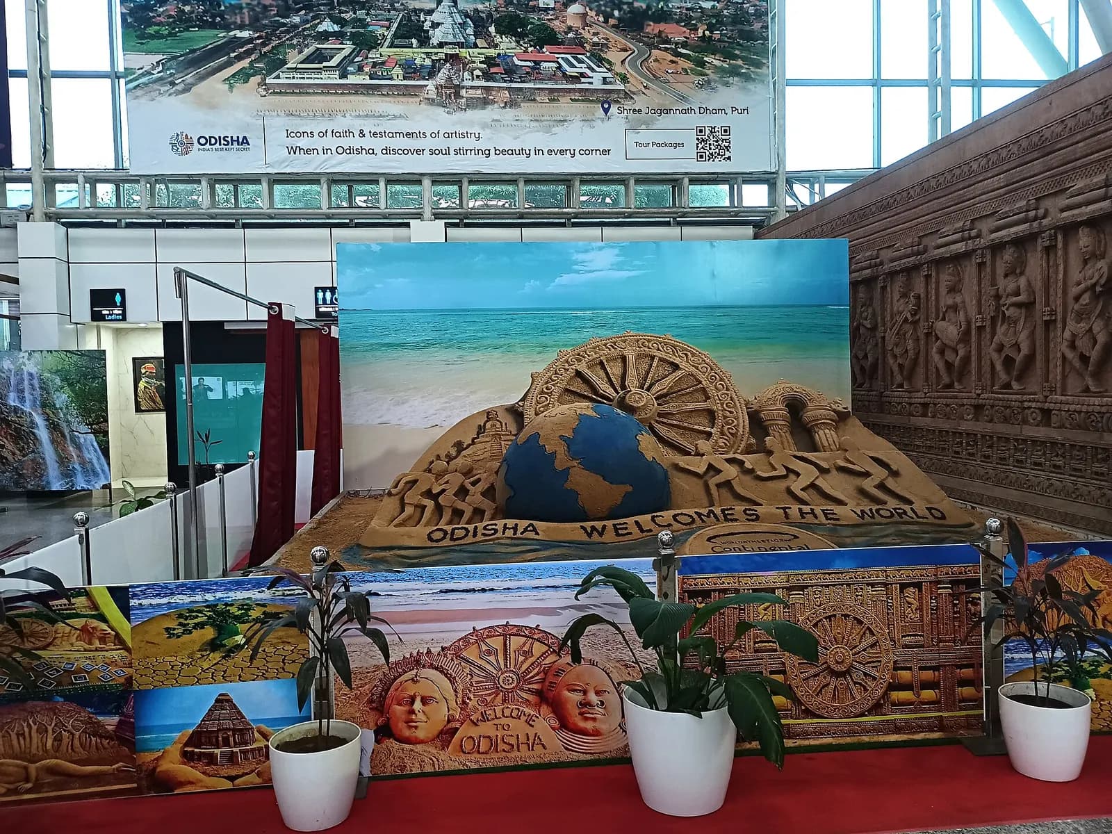 Odisha tourism sand-art and Jagannath Dham display inside Biju Patnaik Airport arrivals