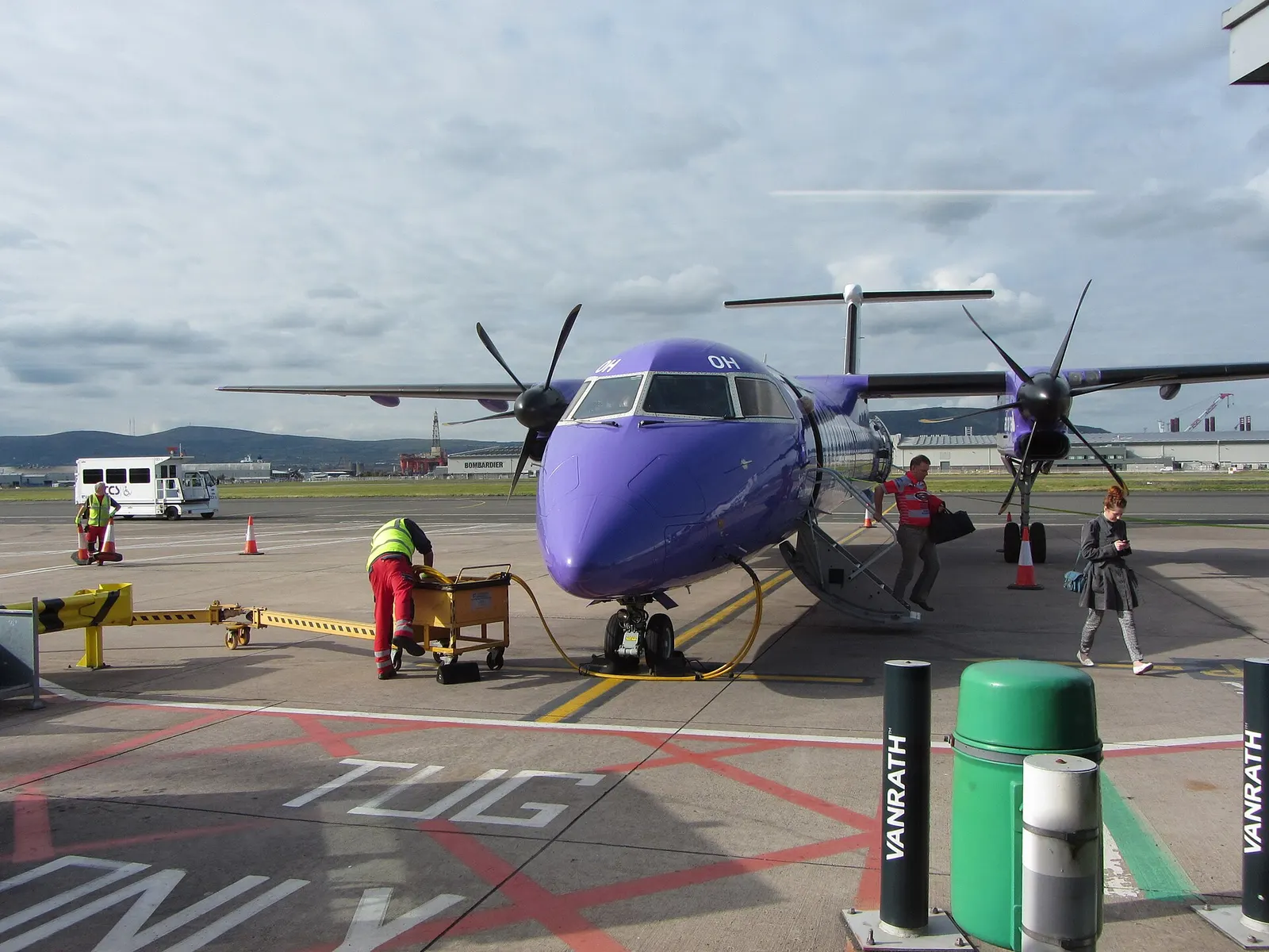 Passengers disembarking on the apron at Belfast City Airport
