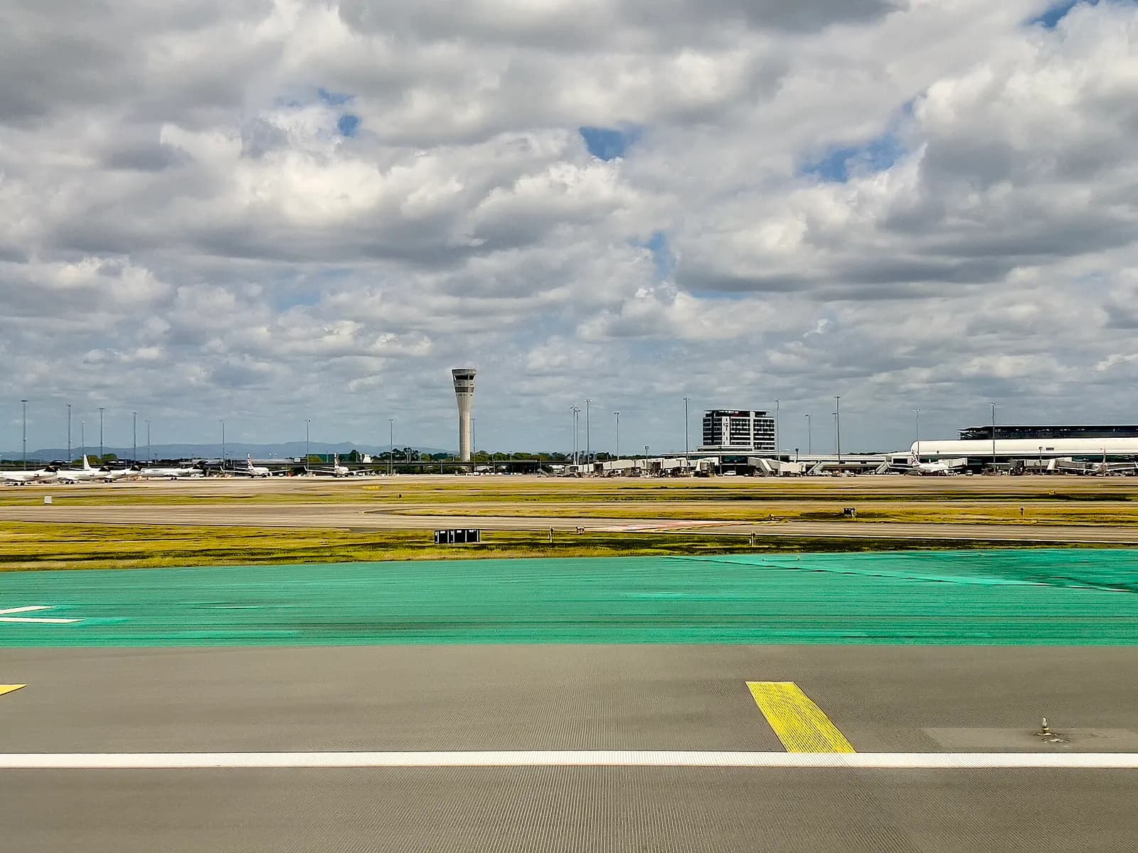 Brisbane Airport Domestic Terminal seen from airside, November 2022