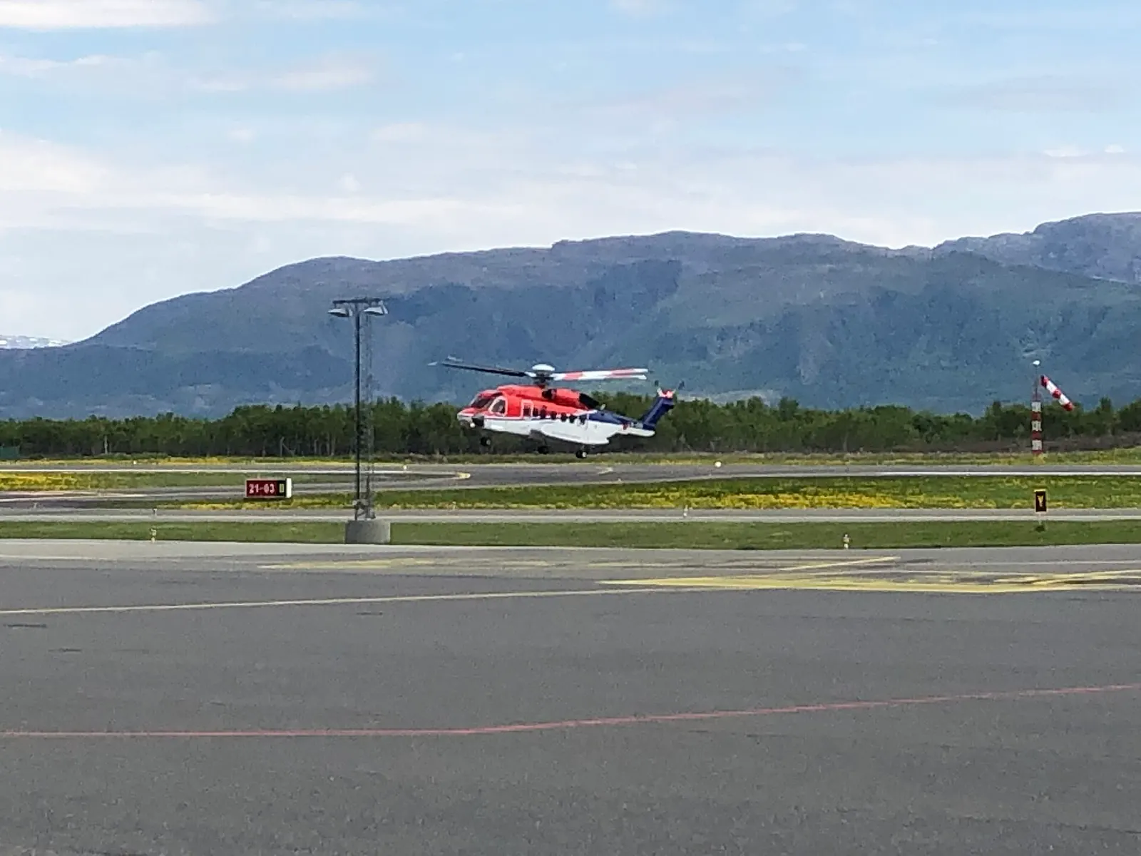 Offshore helicopter on the apron at Brønnøysund Airport