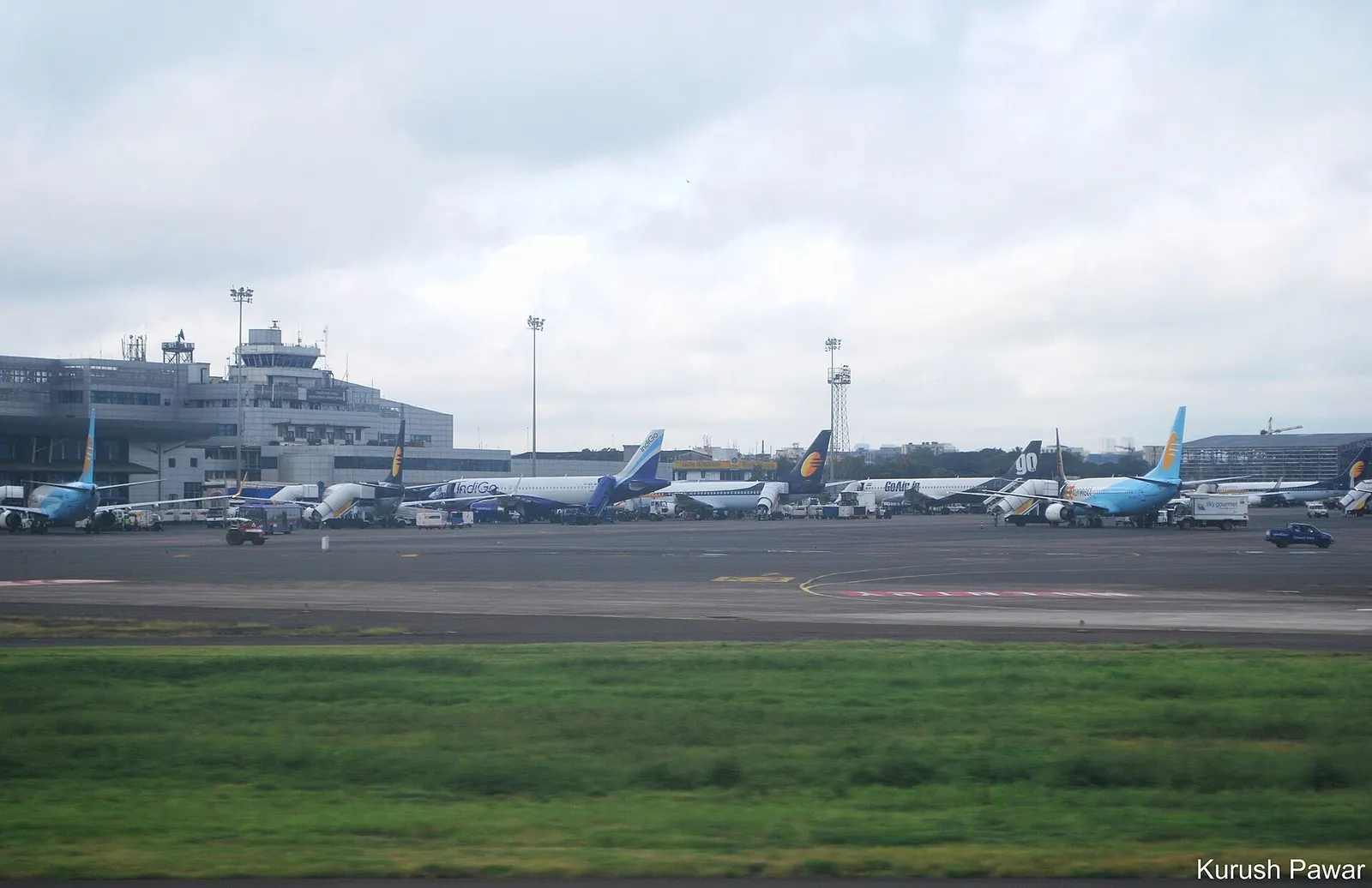 A view of the domestic terminal out the window while taxiing to the international terminal after arriving from DXB. A few other domestic carriers noticeable here including GoAir (VT-WAE) and IndiGo (VT-IEV). Like my Facebook fan page: www.facebook.com/KurushPawarPlaneSpotting