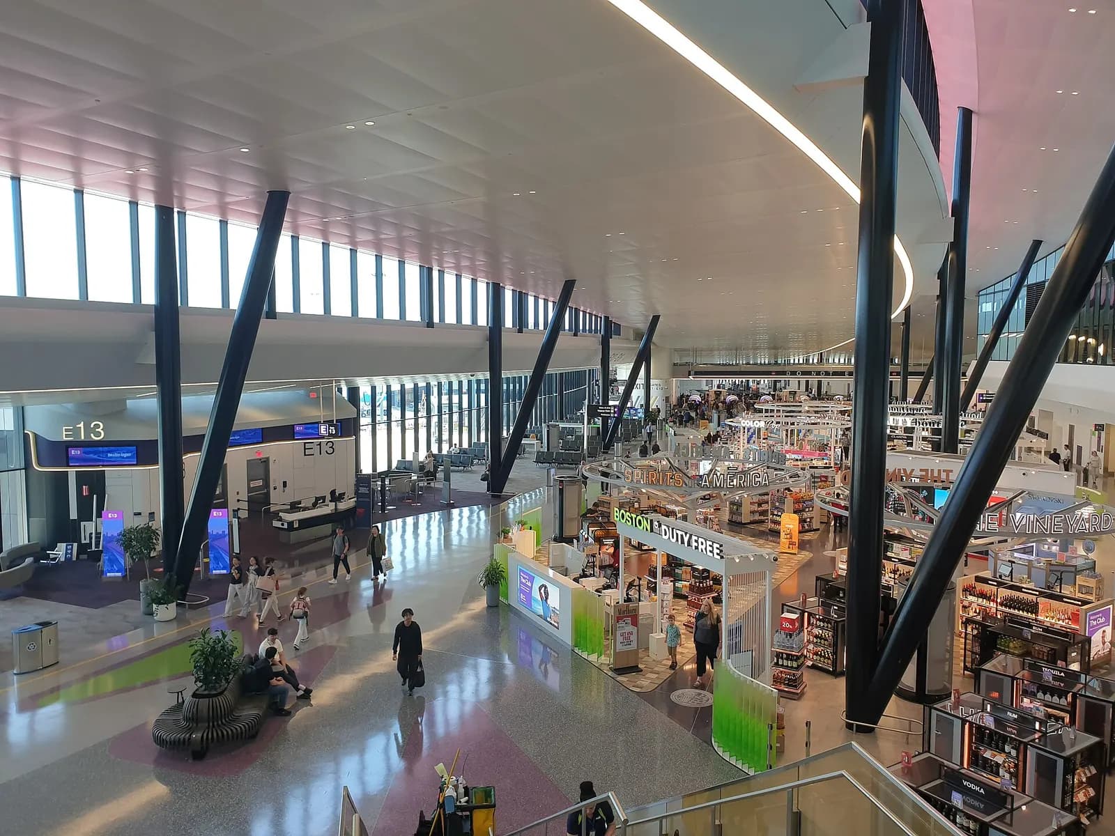 The exterior facade and entrance area of Terminal E at Boston Logan International Airport.
