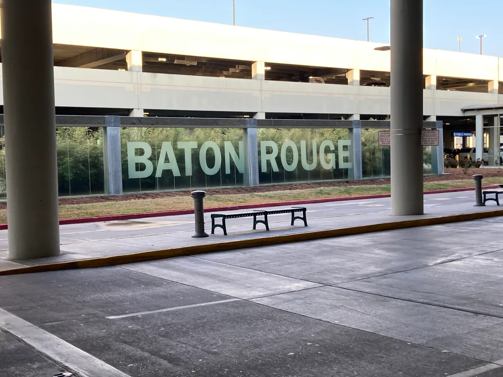 March 2021 exterior of the Baton Rouge Metropolitan Airport terminal and curb.