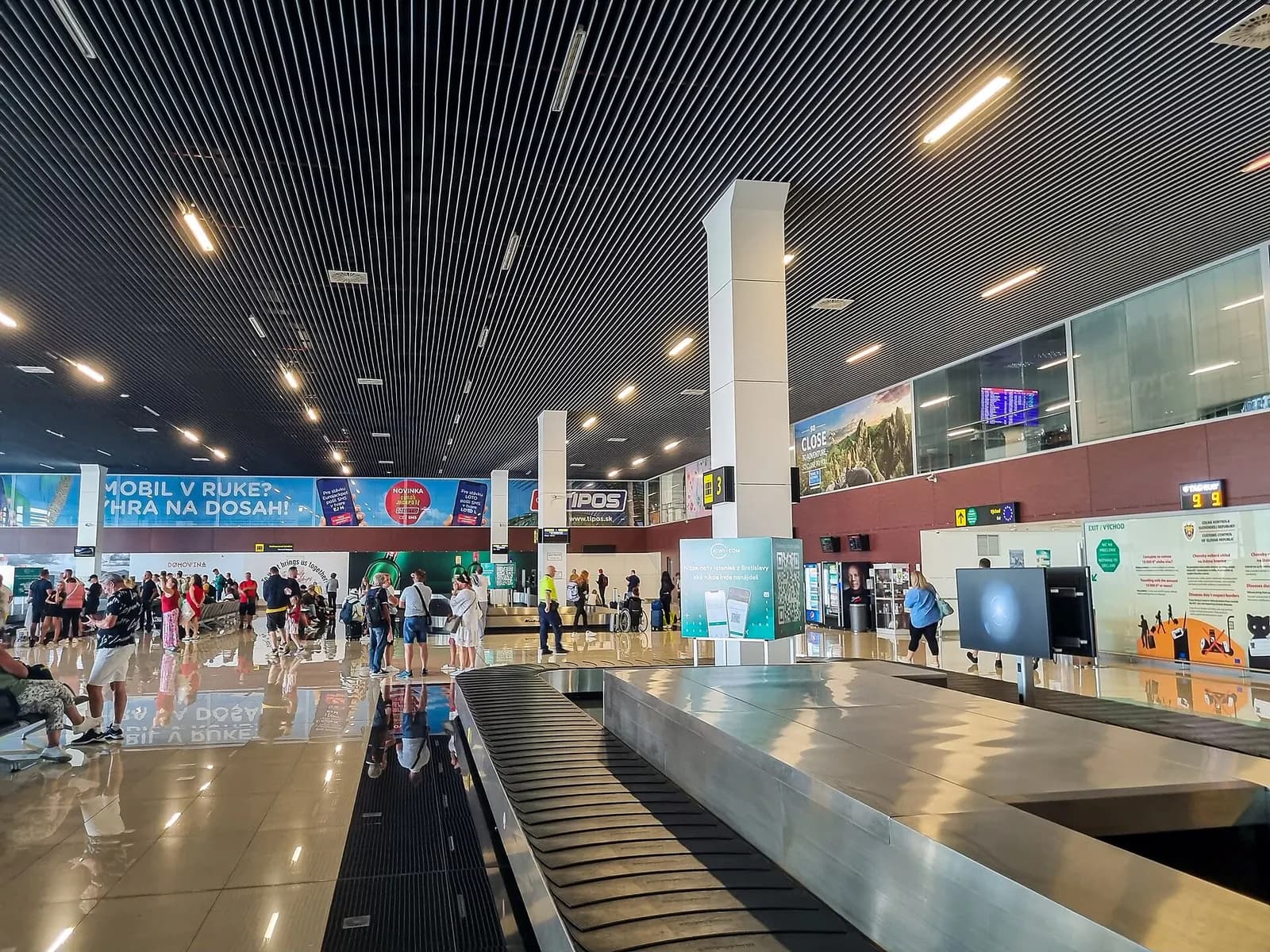Arrival gate & exit at Bratislava Airport (M. R. Štefánika) in Slovakia.