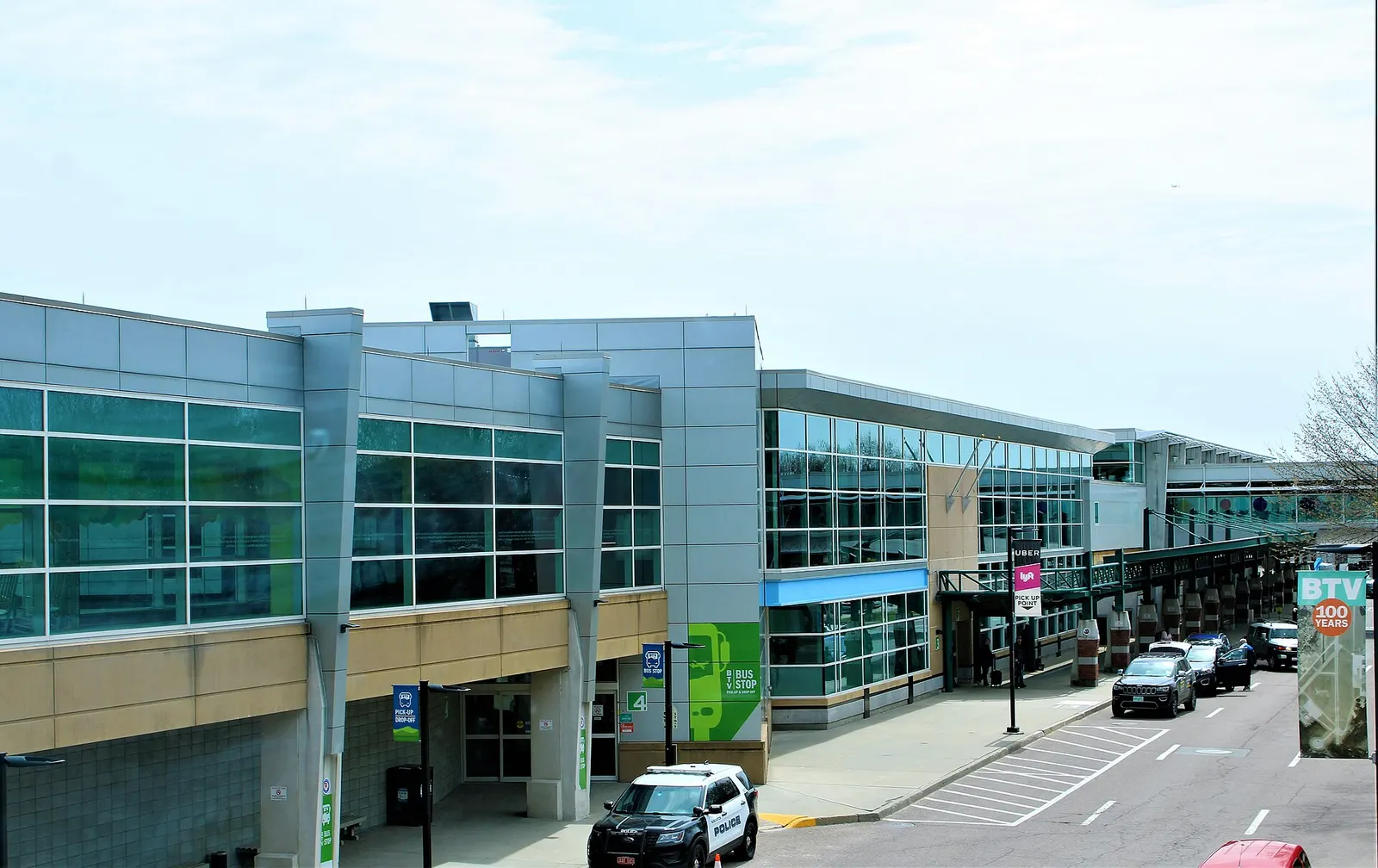 Passenger terminal exterior at Burlington International Airport on a clear April day.