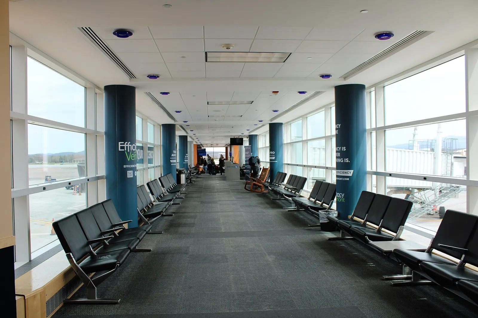 Holdroom seating facing Gates 3 through 6 at Burlington International Airport.