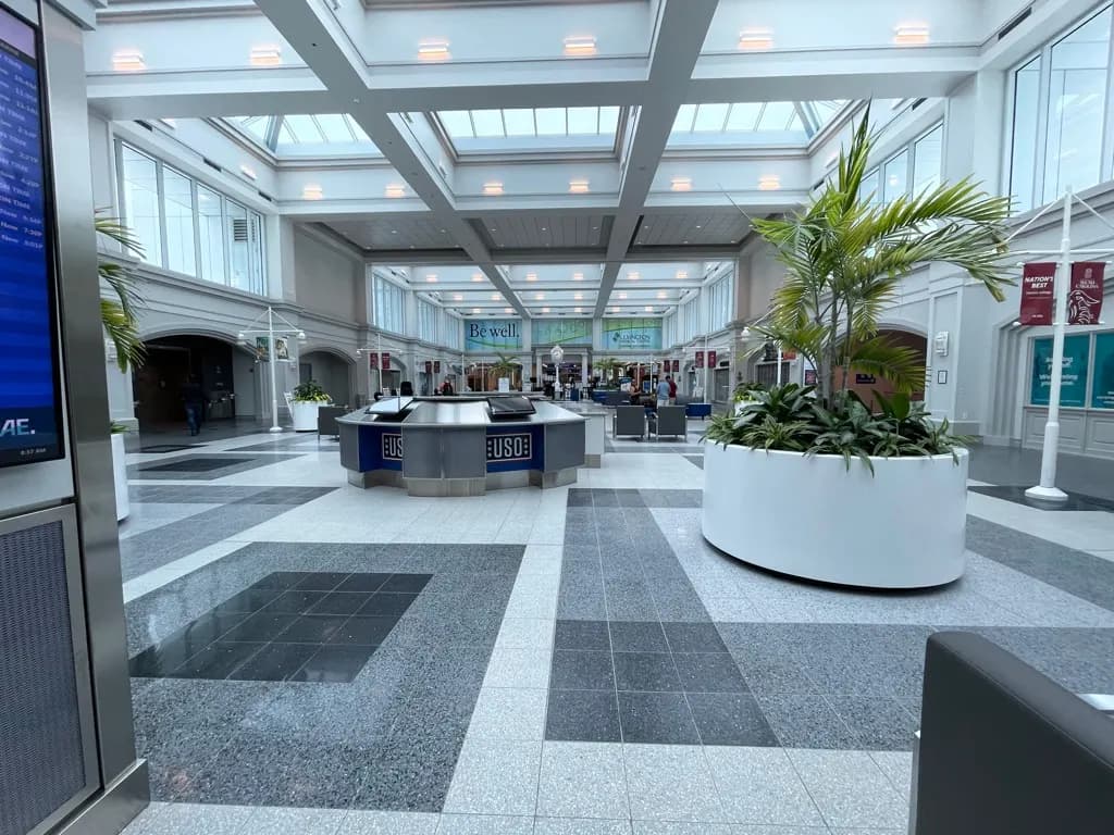 July 2022 landside hall at Columbia Metropolitan Airport looking toward the pre-expansion TSA checkpoint