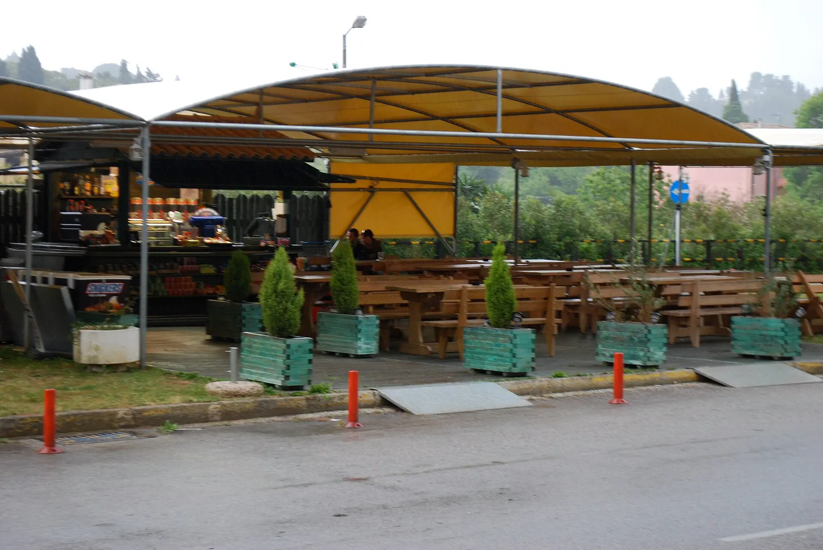 Café seating area inside Corfu Airport
