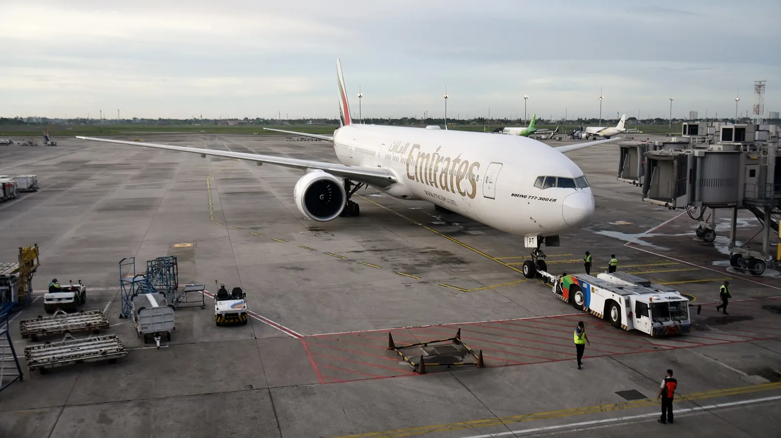 Emirates Boeing 777-31H(ER) A6-EPT about to be pushed back from Terminal 3 at Soekarno–Hatta International Airport (CGK/WIII) near Jakarta, Indonesia, on departure from Dubai International Airport (DXB/OMDB), Dubai, United Arab Emirates, as EK357