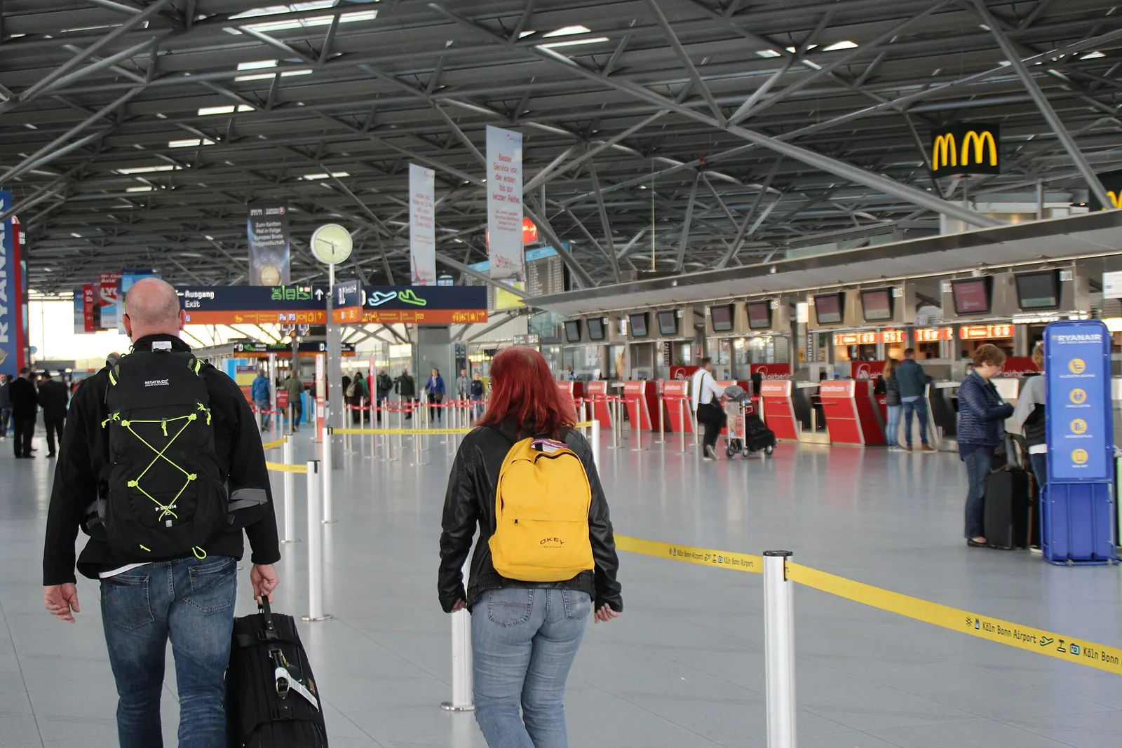 The bright, open interior of Terminal 2 with departure gates, seating, and passenger walkways.