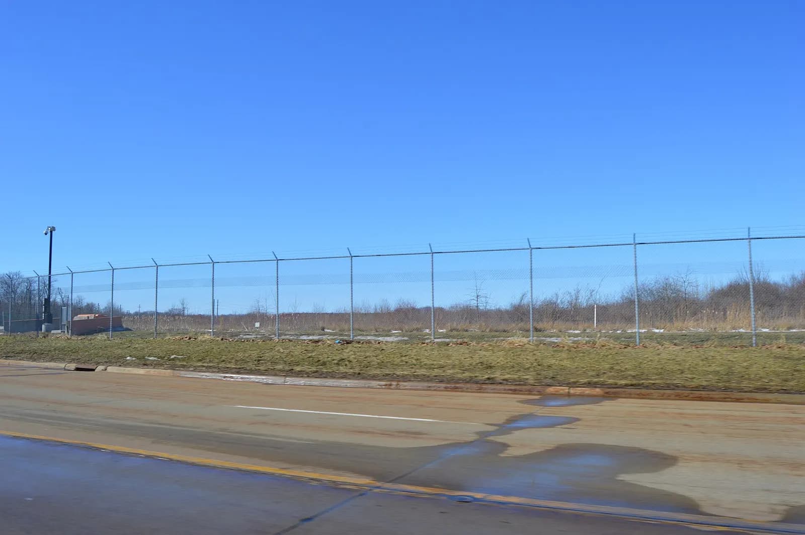 Overview of the site of the Samuel Danalds House , located along Aerospace Parkway in Brook Park , Ohio , United States . It was listed on the National Register of Historic Places in 1979, but it has since been destroyed for a project to expand Cleveland Hopkins International Airport ; however, it h