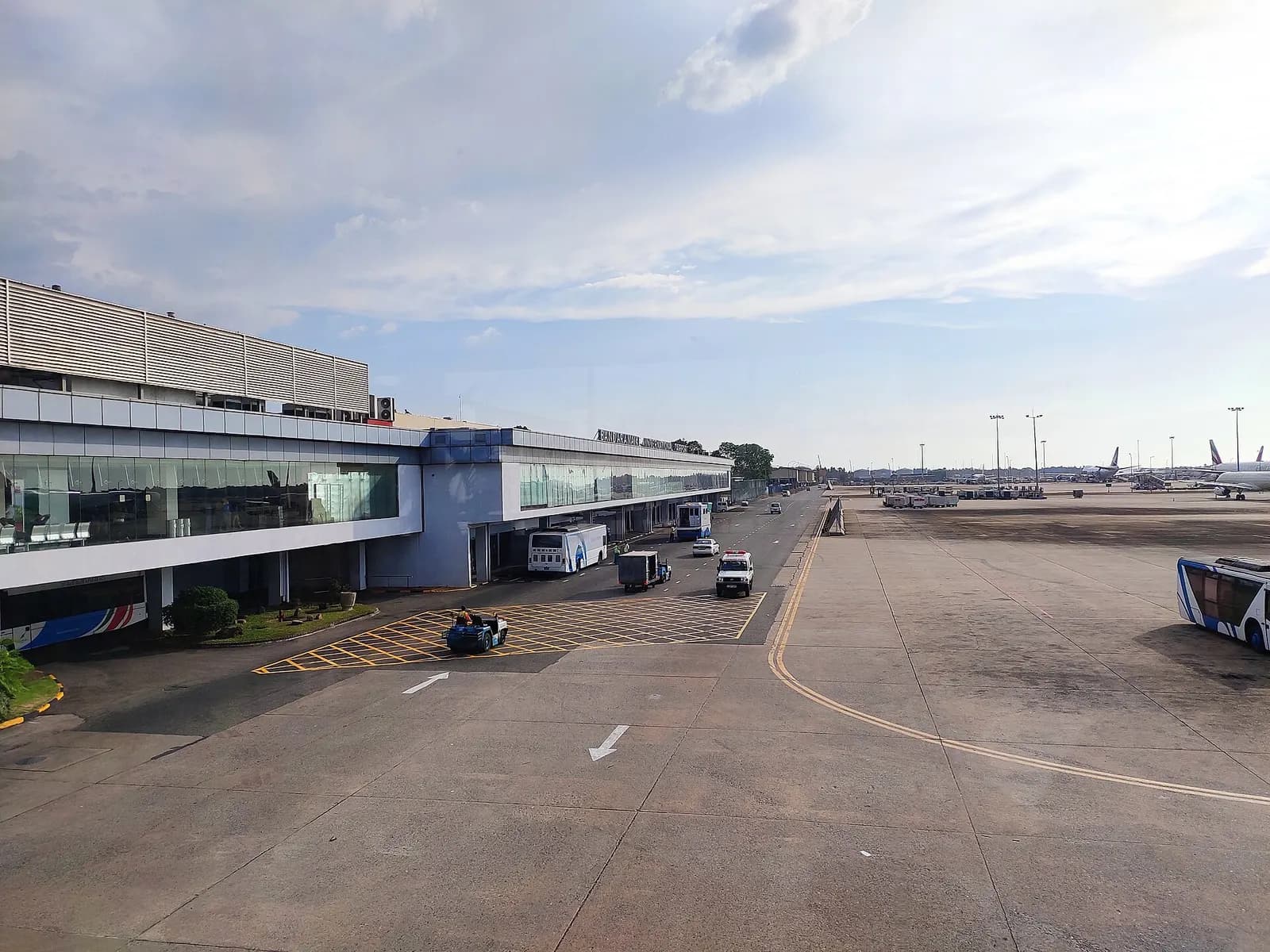 Terminal apron face with BANDARANAIKE INTERNATIONAL AIRPORT lettering at CMB