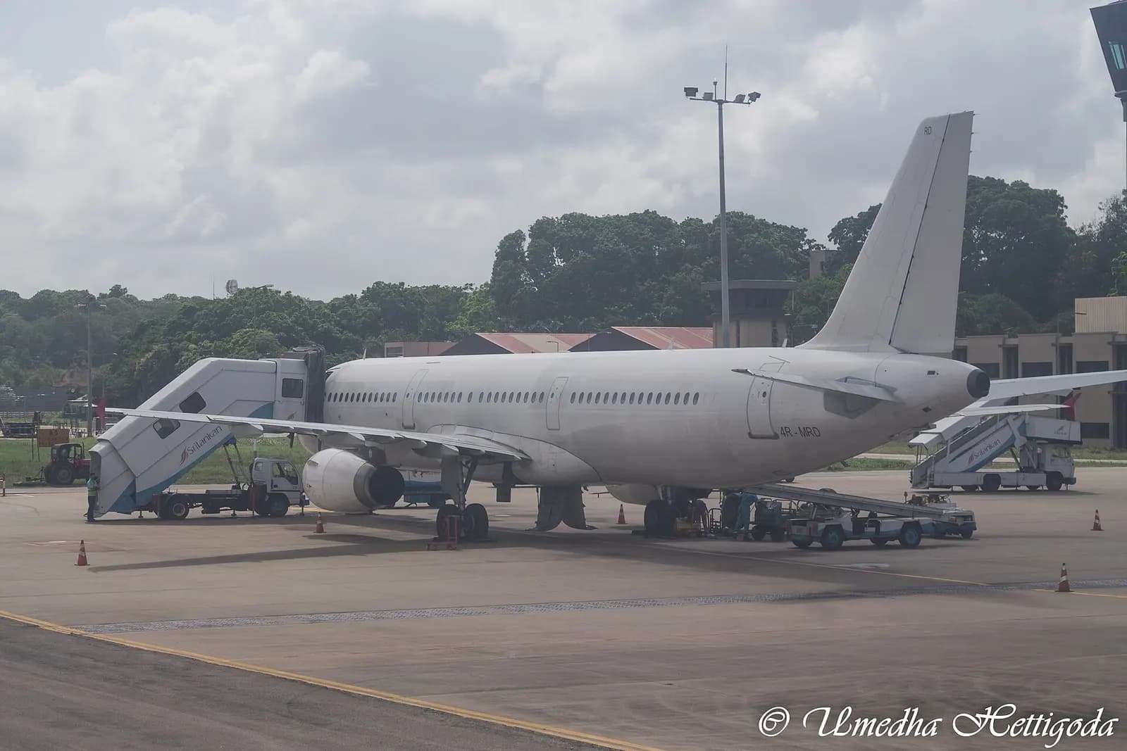 SriLankan Airlines Airbus A321-231 4R-MRD with mobile stairs at Bandaranaike International Airport