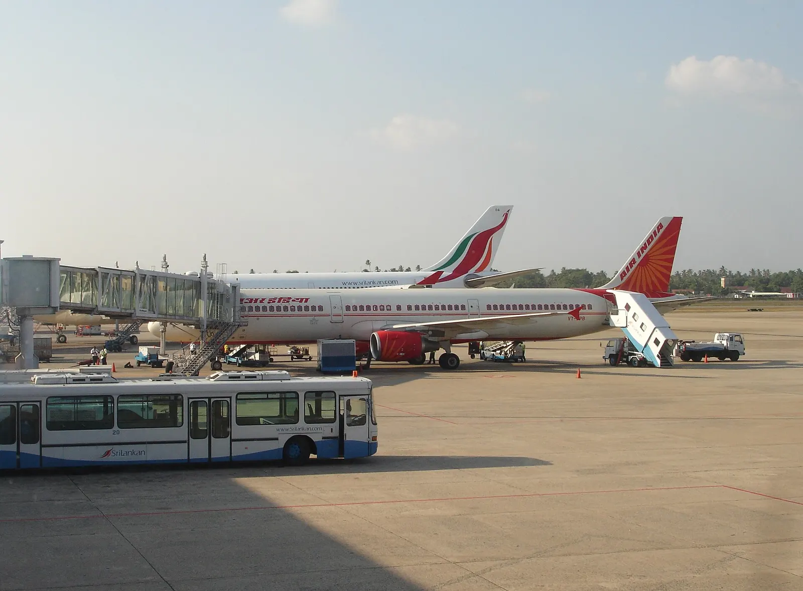 Air India and SriLankan Airlines aircraft parked at the Colombo Bandaranaike terminal apron