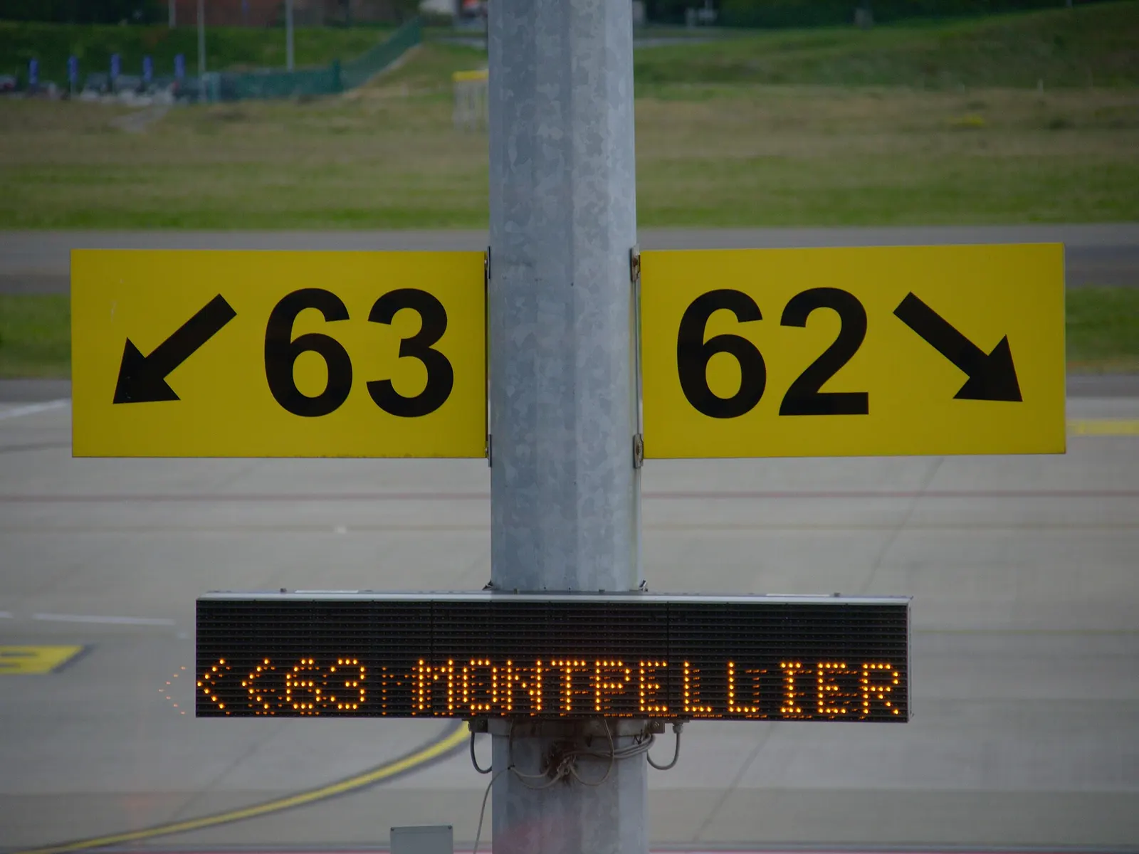 Airport directional signage for Brussels South Charleroi Airport.