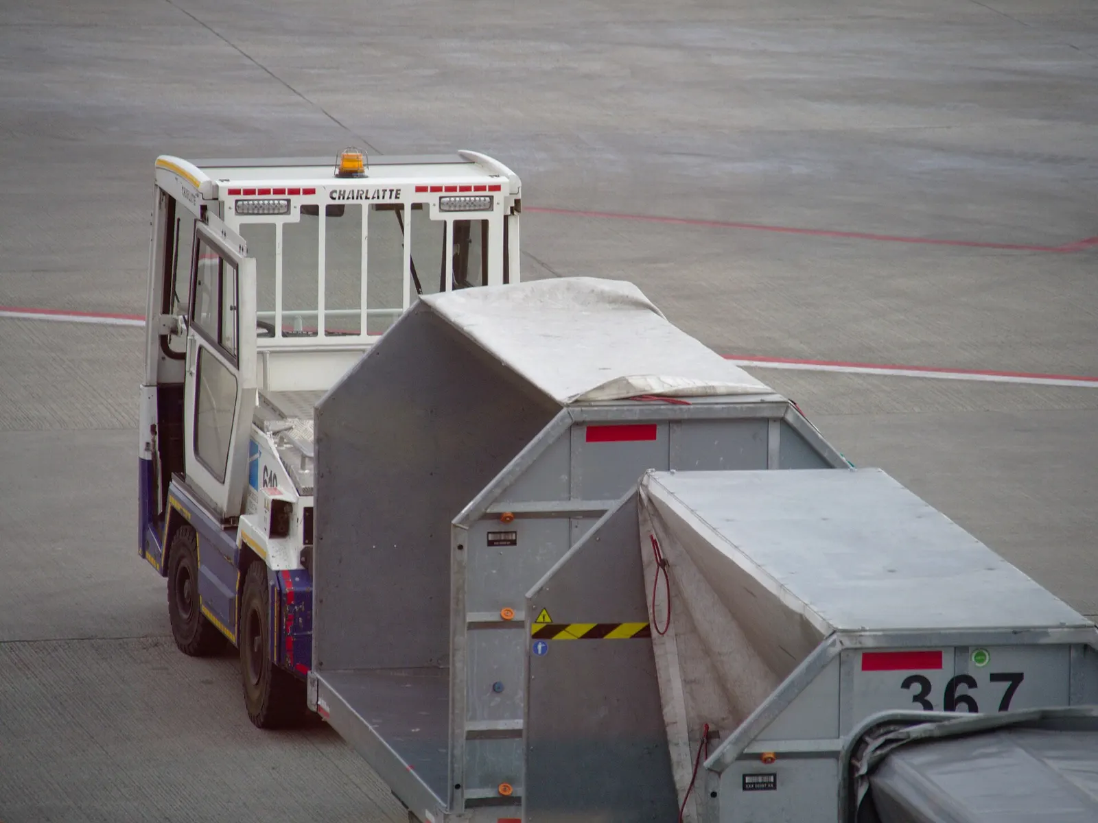 Approach road and landside curb traffic at Brussels South Charleroi Airport.