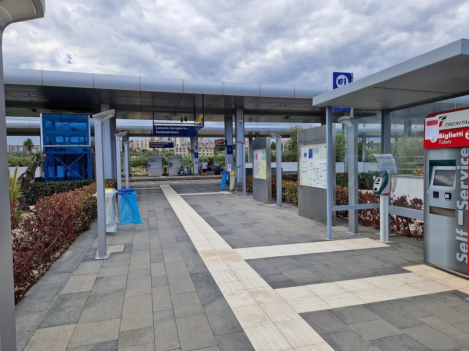 Entrance to Catania Aeroporto Fontanarossa railway station with ticket machines