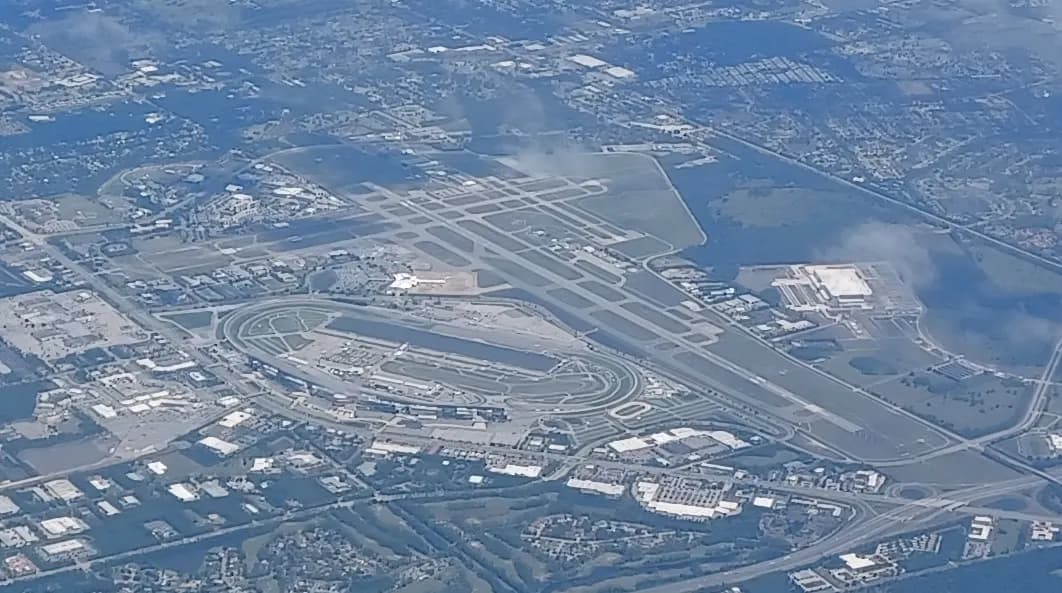 April 2023 aerial of Daytona Beach International Airport beside Daytona International Speedway