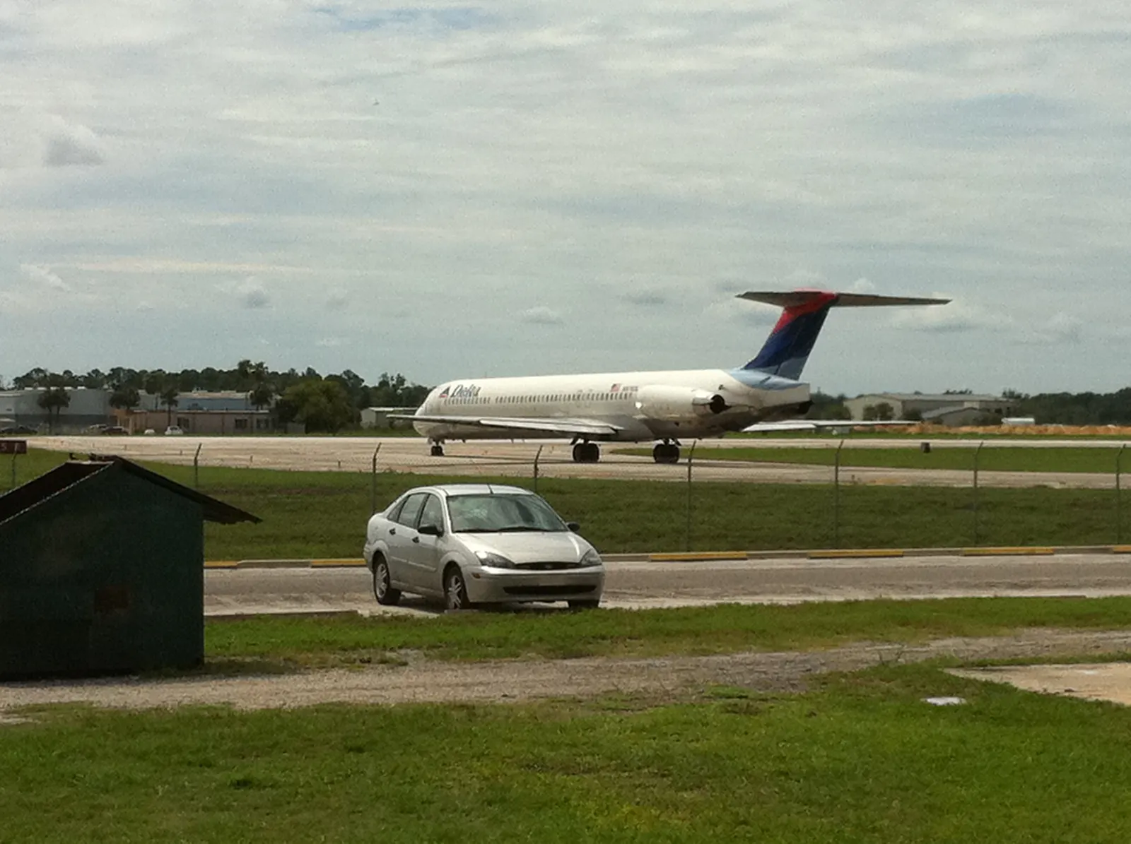 Historic 2010 Delta MD-80 departing runway 25R at Daytona Beach International Airport