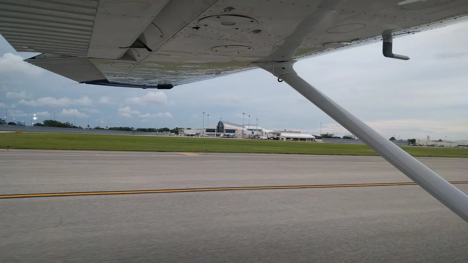 Historic 2017 view of the Daytona Beach International Airport passenger terminal from a Cessna 172
