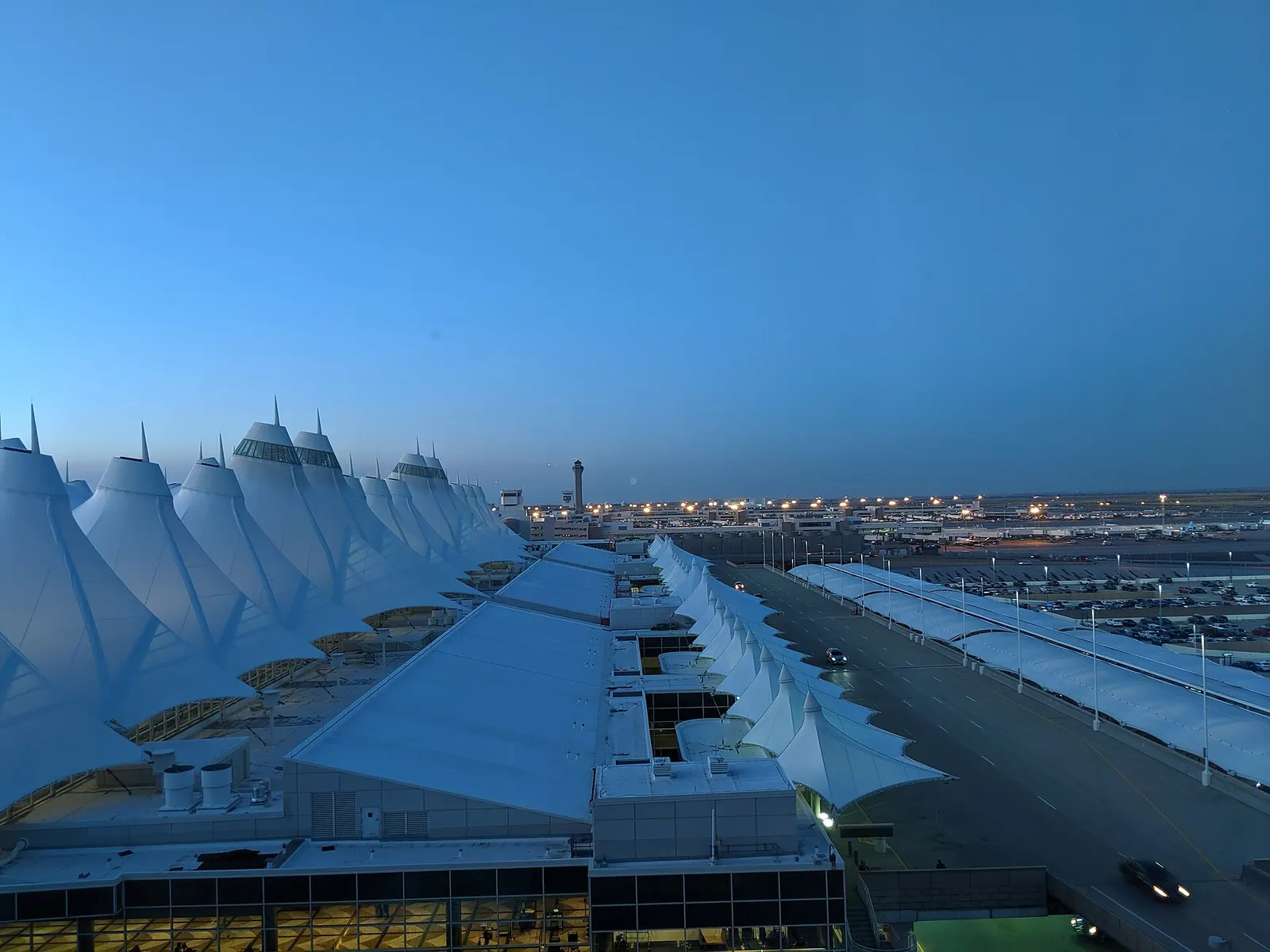 Denver International Airport Main Terminal at dusk from the Westin Hotel (13th floor)