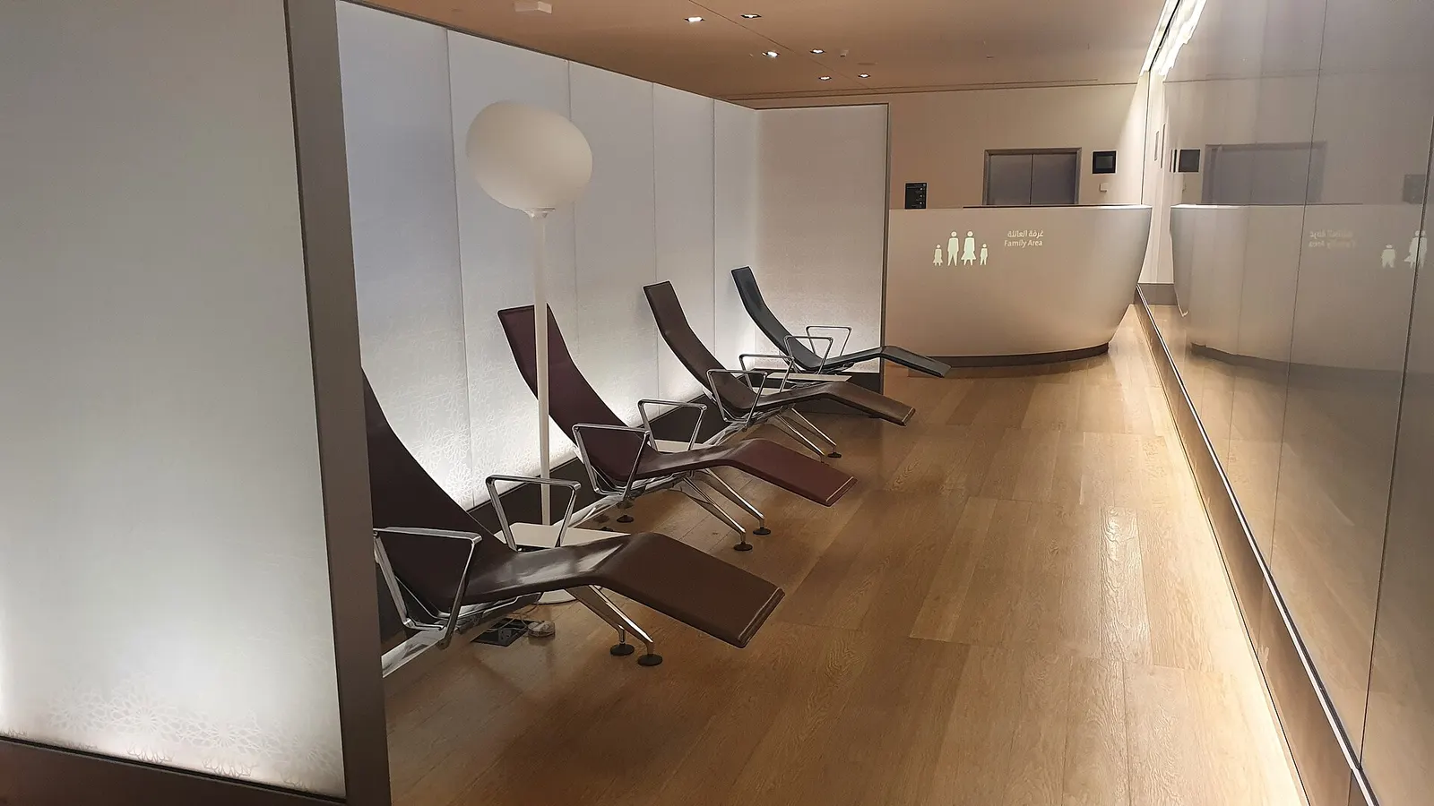 A quiet snooze room with reclining chairs for resting in Concourse B at Hamad International Airport.