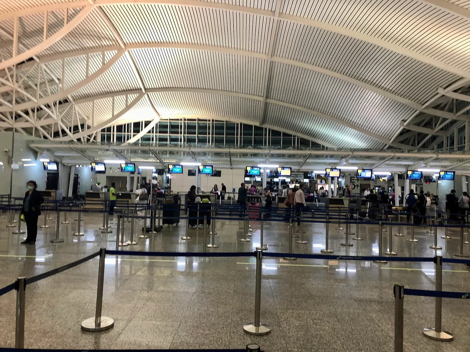 Immigrations arrival hall and its counters at international I Gusti Ngurah Rai Airport (Bali Airport).