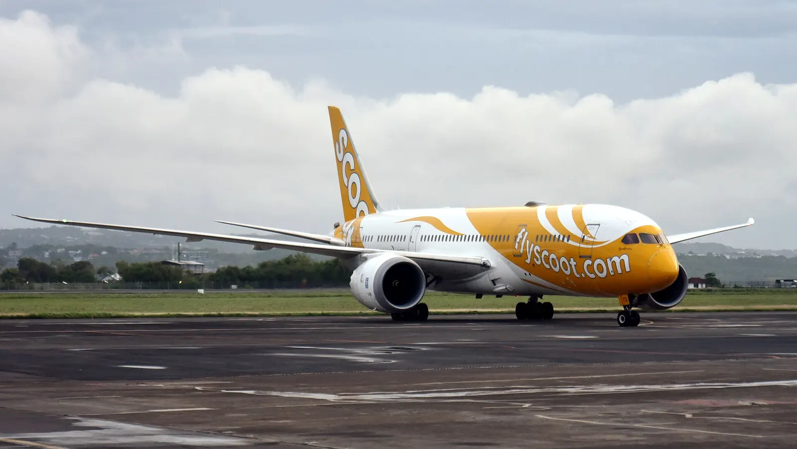 Scoot Boeing 787-8 9V-OFG Kama Scootra taxiing towards the International Terminal at Ngurah Rai International Airport (DPS/WADD), Denpasar, Bali, Indonesia, on arrival from Singapore (SIN/WSSS) as TR282