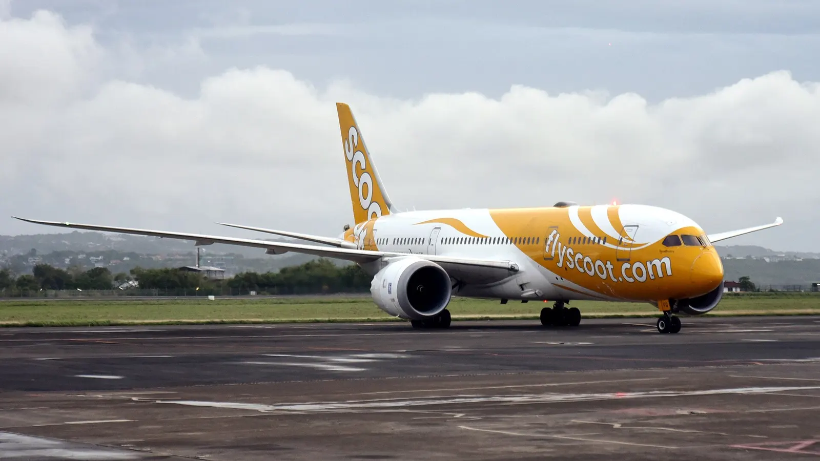 Scoot Boeing 787-8 9V-OFG Kama Scootra taxiing towards the International Terminal at Ngurah Rai International Airport (DPS/WADD), Denpasar, Bali, Indonesia, on arrival from Singapore (SIN/WSSS) as TR282