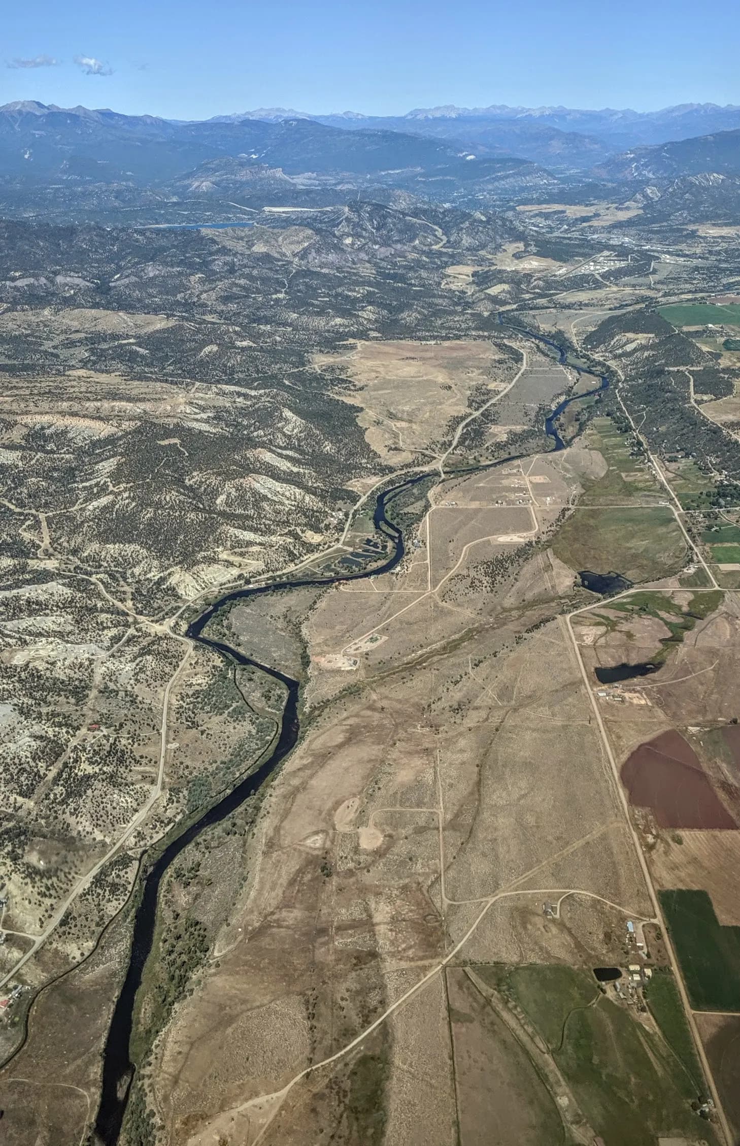 Aerial view looking north up the Animas River toward Durango, taken on takeoff from Durango-La Plata County Airport.
