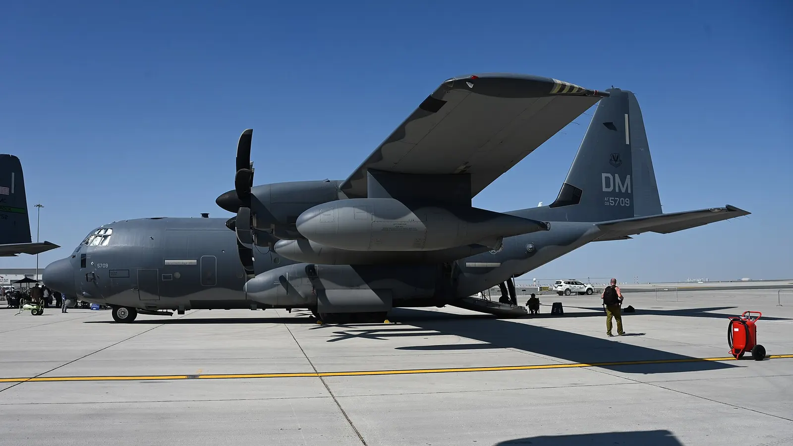 A U.S. Air Force HC-130J Combat King II aircraft is parked for display at Al Maktoum International Airport, Dubai, UAE, Nov. 14, 2023, during the Dubai Airshow. The U.S. maintains a highly agile aircraft force, which leverages the most advanced training and platforms to dominate the warfighting land
