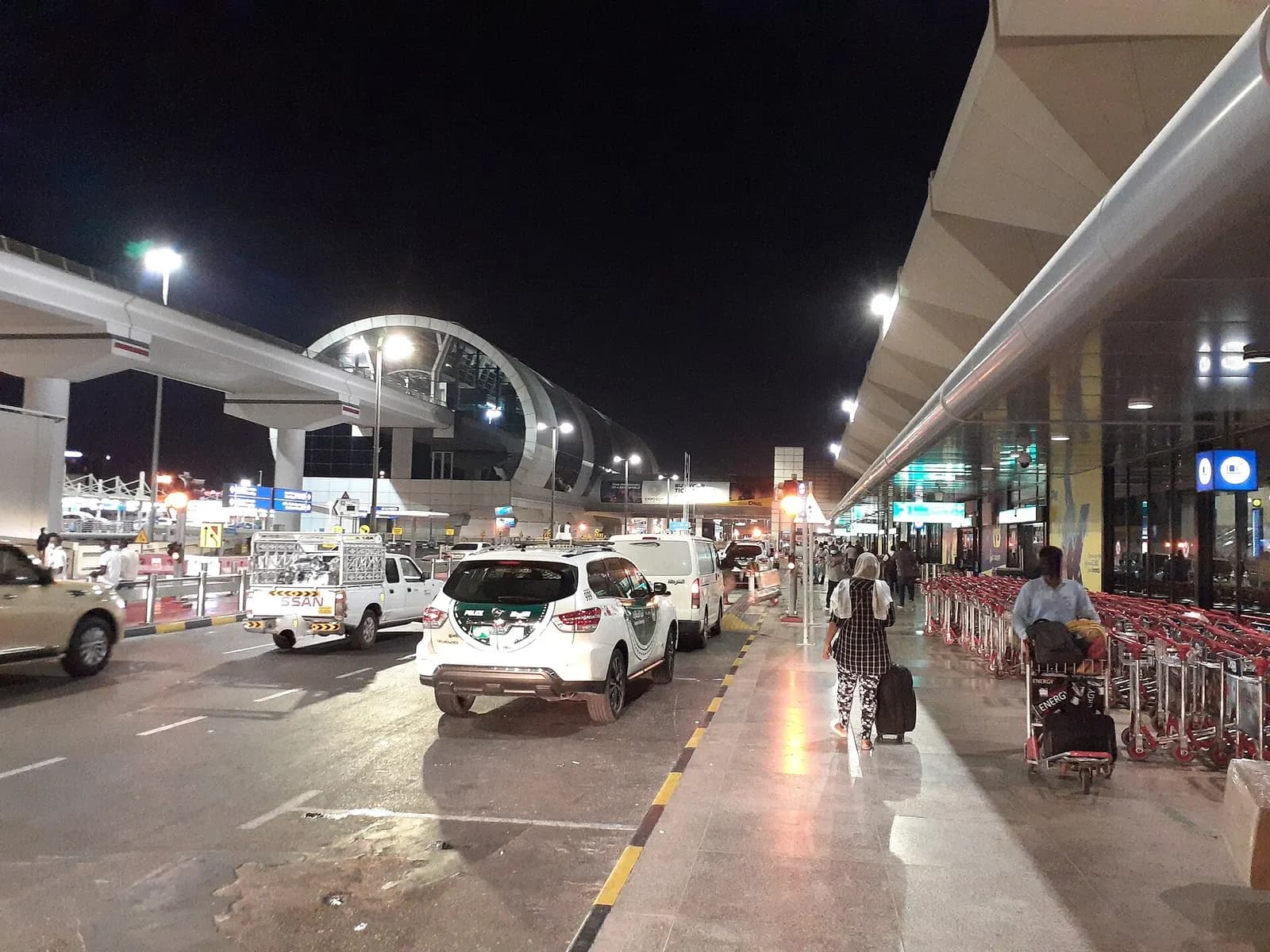 The Terminal 1 building at Dubai International Airport viewed from the landside approach.
