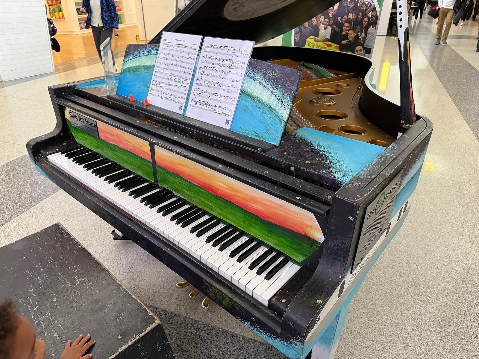 A Sing for Hope Piano within Terminal C of Newark Liberty International Airport in Newark, Essex County, New Jersey
