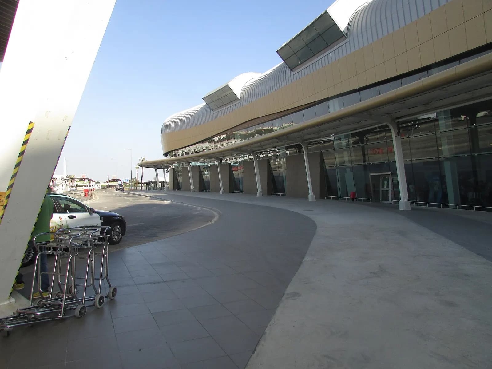 Outside the arrivals hall at Faro airport, Algarve, Portugal.