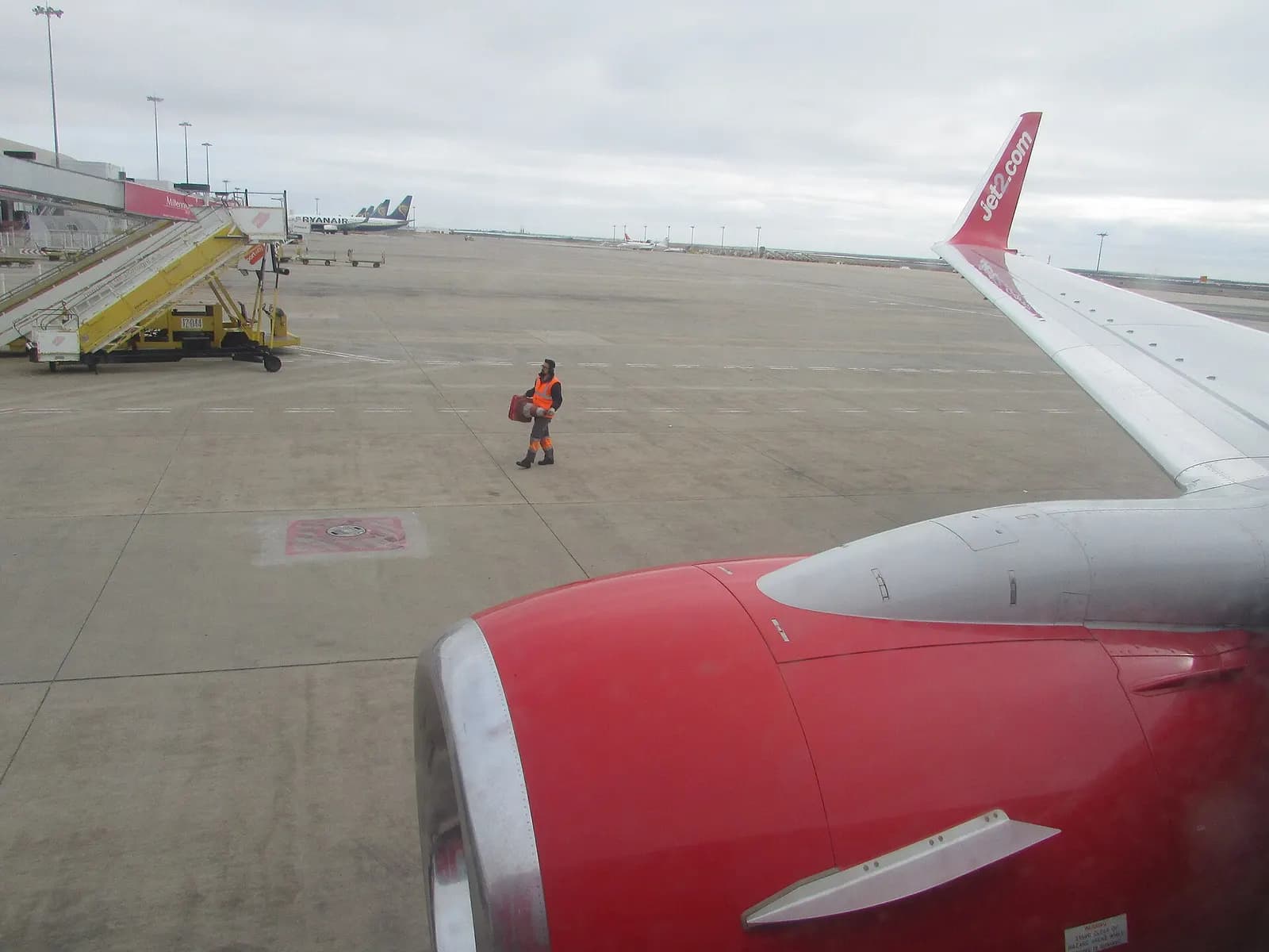A view of the terminal taken from the window of the Boeing 737 (G-JZHJ) of Jet2 as it is about to depart from Faro airport in the city of Faro , Algarve, Portugal.