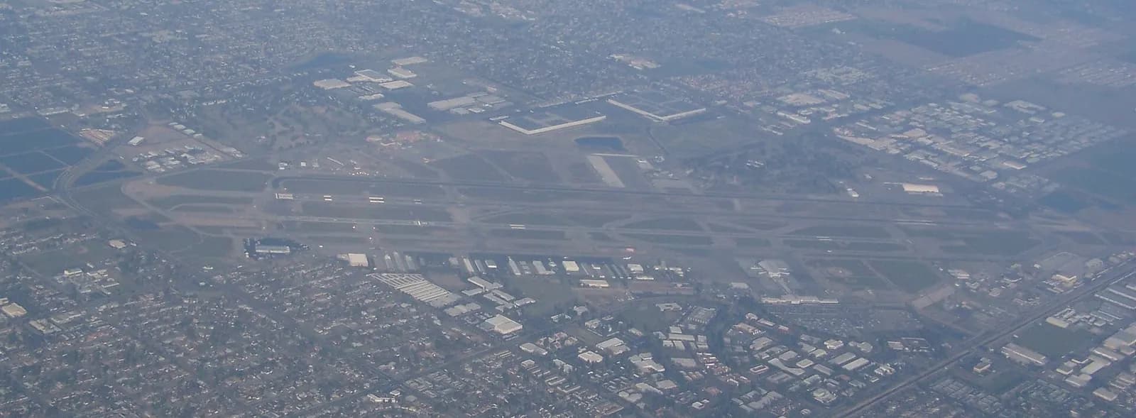 Low aerial of the FAT passenger terminal and apron from 2008.
