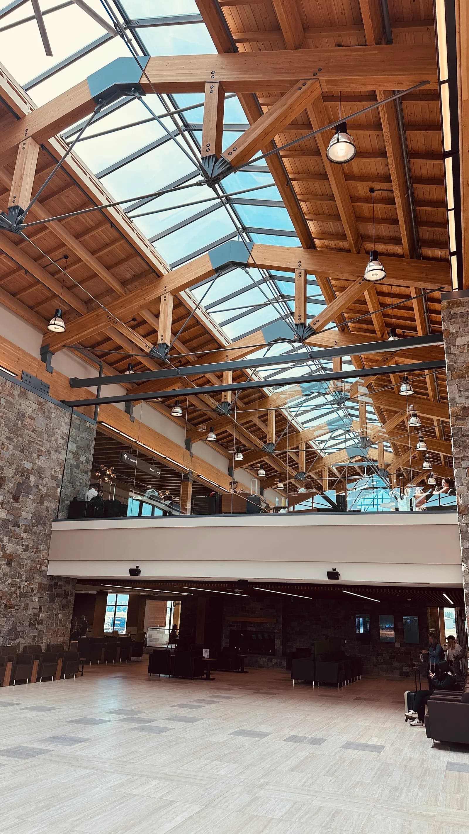 Wood-beamed Great Hall atrium at Glacier Park International Airport, 30 July 2025