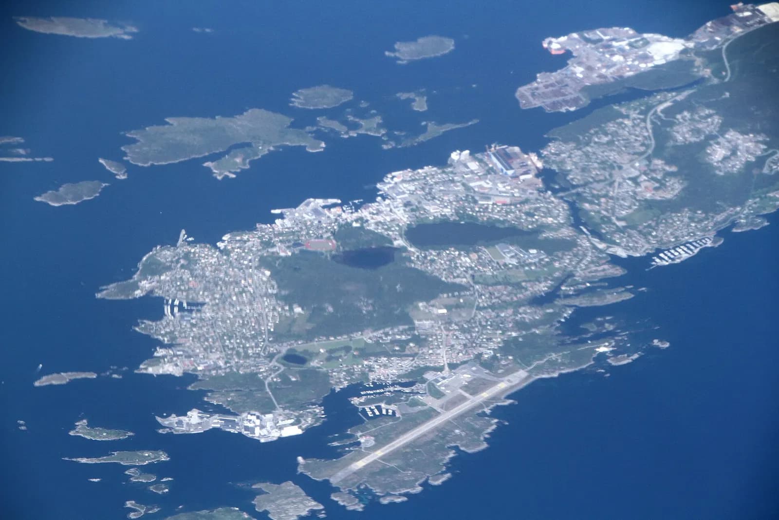 Aerial view over coastal Flora/Florø including the airport peninsula on Florelandet.